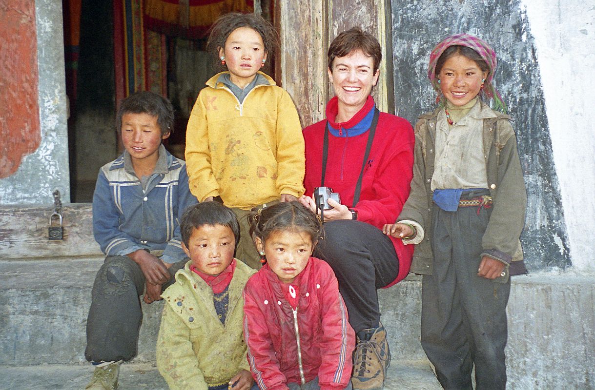 10 Shane With Tibetan Children Outside Milarepa Cave Gompa